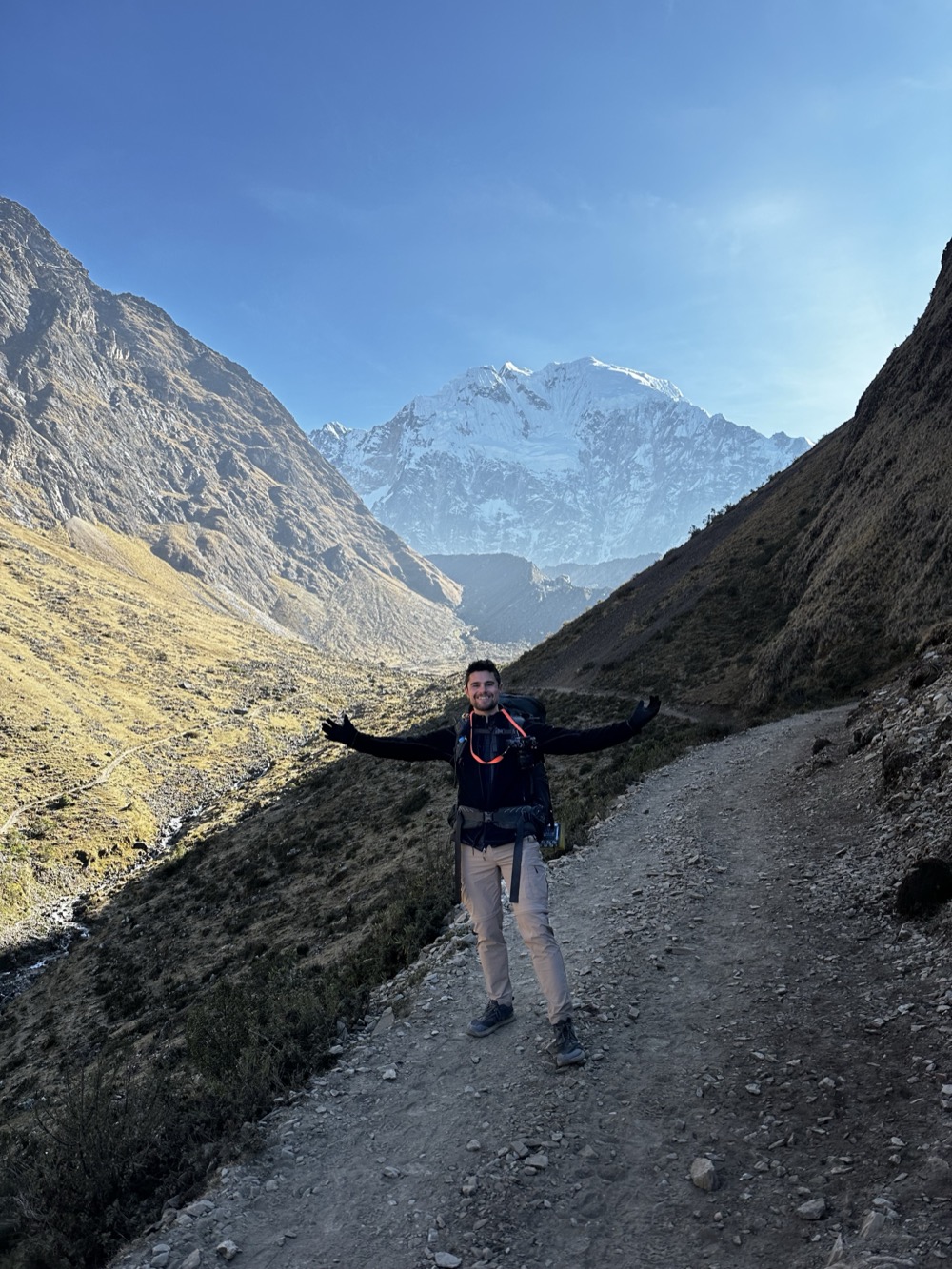 Jon trekking through mountains in Peru